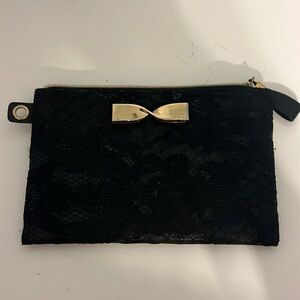 Going out on the town?? Take this beautiful small black clutch